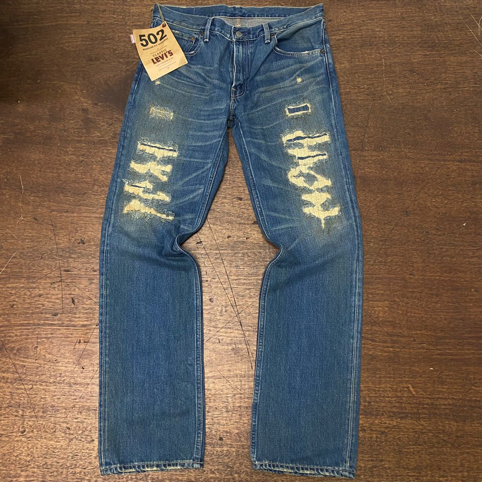 Levis 502 distressed jeans 34x33